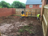 New patio in Exeter with a small picket fence