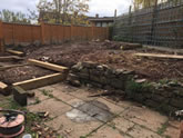 New garden landscape project including the construction of garden steps, flowerbeds and garden decking